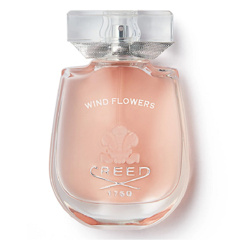 Creed Wind Flowers perfume bottle on a white background