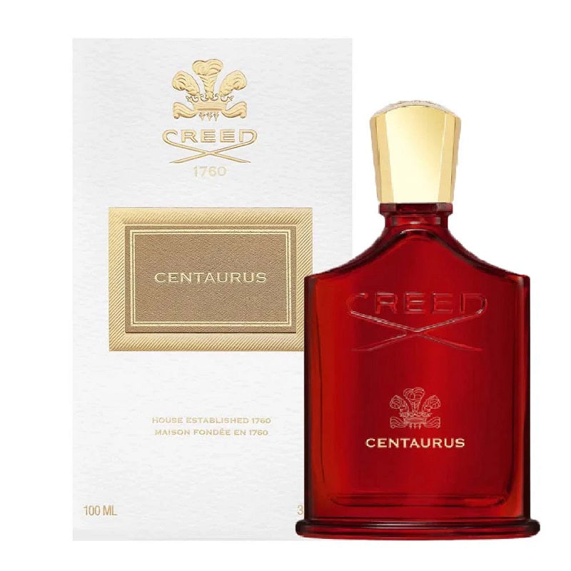 Red Creed Centaurus perfume bottle with gold cap and packaging on a white background