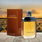 Davidoff Adventure perfume bottle and packaging with a sunflower field background