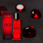 Davidoff Hot Water perfume bottle and packaging with red gemstones on a dark background