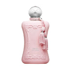A pink bottle of Delina Exclusif 75ml Eau de Parfum by Parfums De Marly with a decorative cap and tassel.