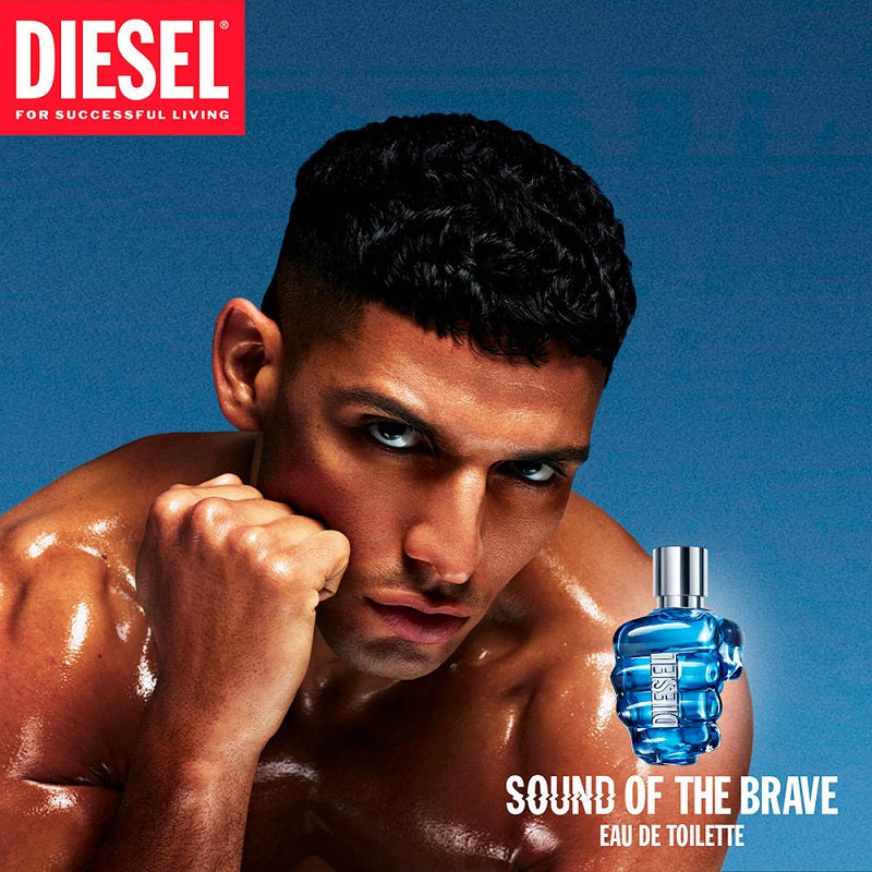 DIESEL advertisement with a muscular man and a blue perfume bottle on a blue background