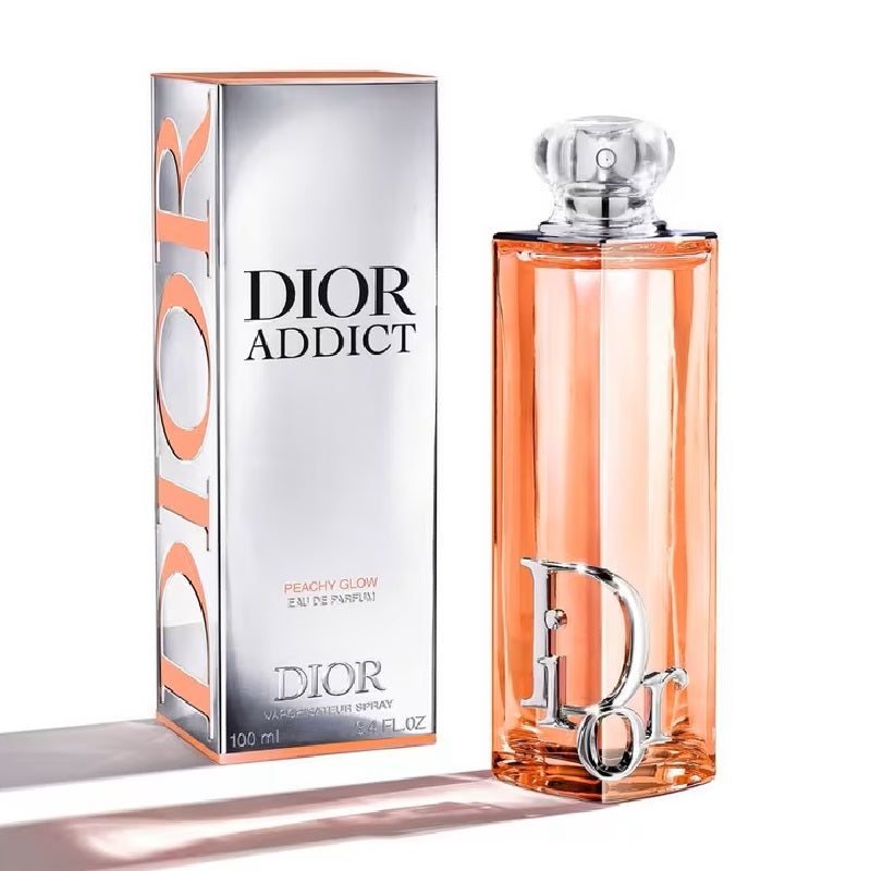 Dior Addict perfume bottle and packaging on a white background