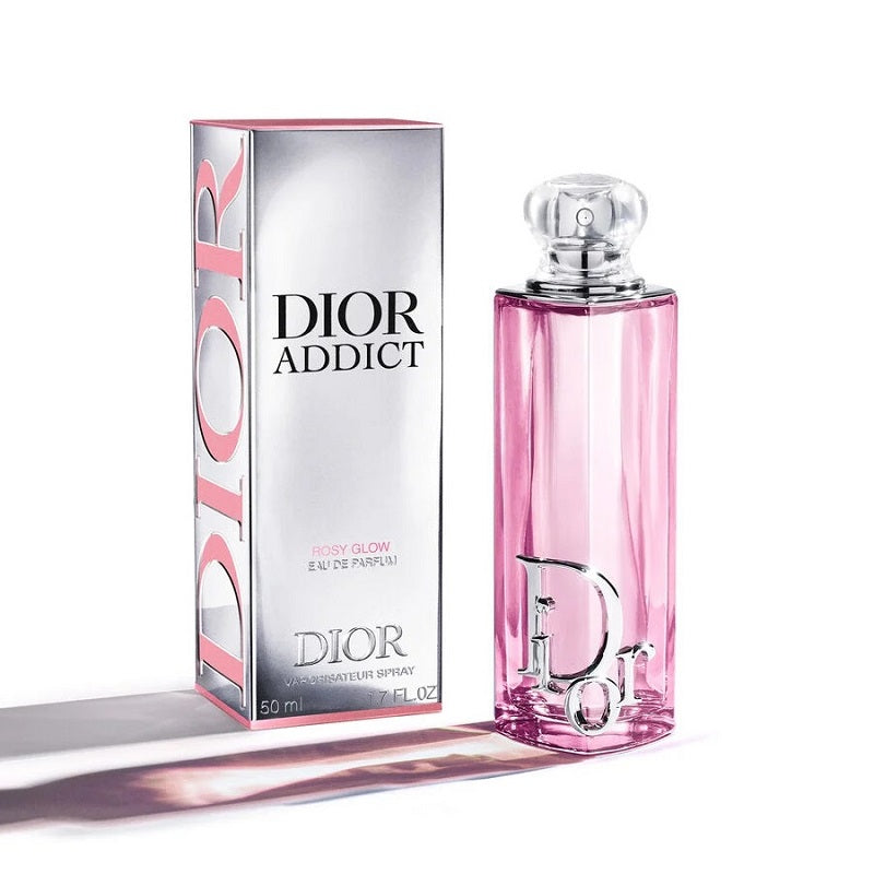 Dior Addict perfume bottle and packaging on a white background