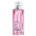 Pink Dior perfume bottle on a white background