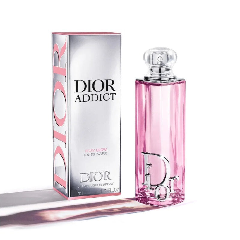 Dior Addict perfume bottle and packaging on a white background