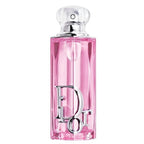 Pink Dior perfume bottle on a white background