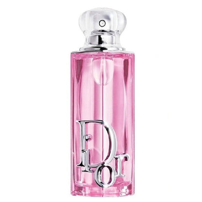 Pink Dior perfume bottle on a white background