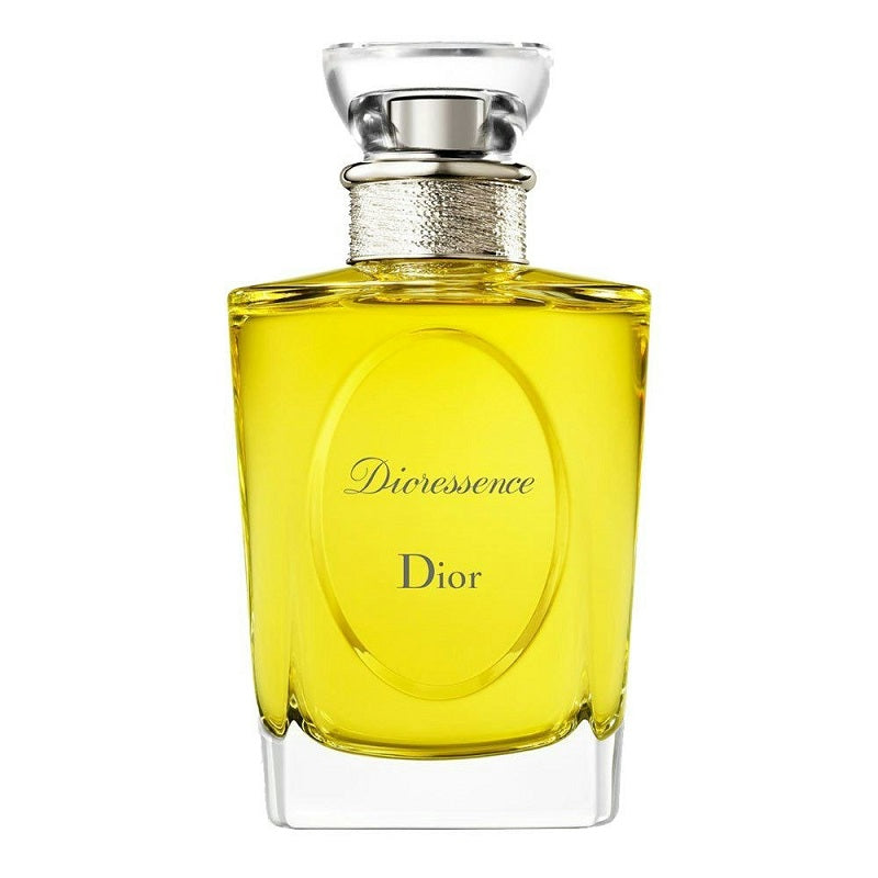 Yellow Dior perfume bottle on a white background