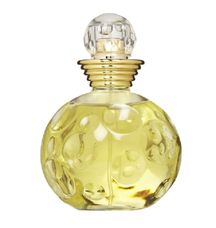 A glass bottle of Dolce Vita Eau de Toilette by Christian Dior with a yellow liquid inside and a gold cap.