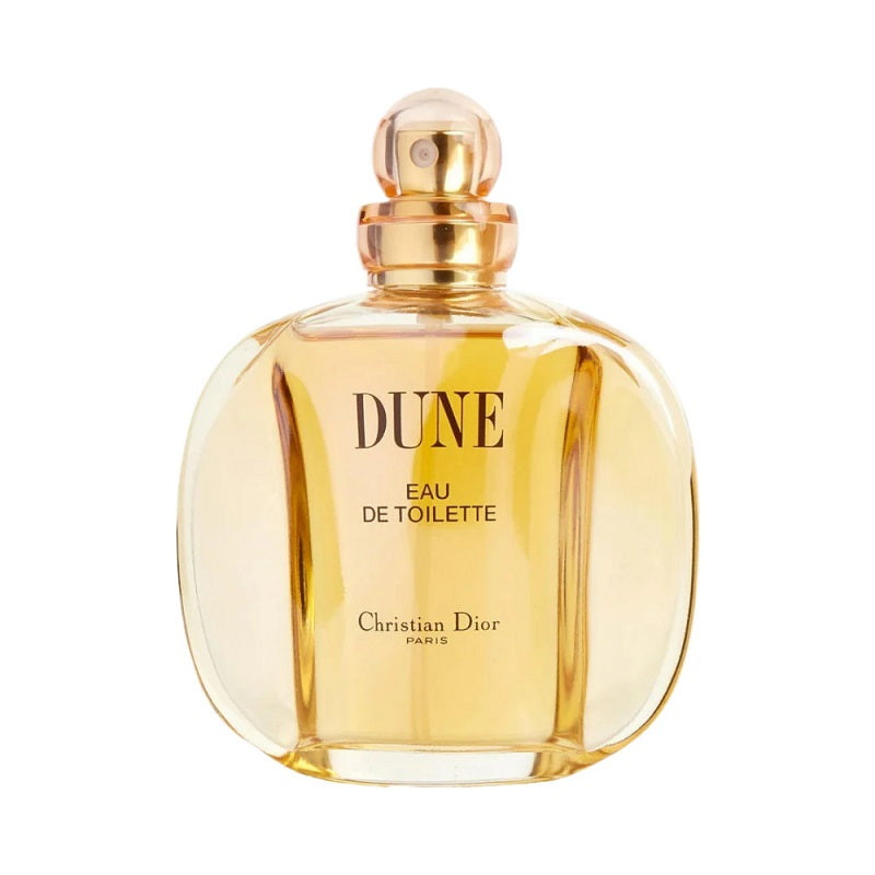 A curved glass bottle of Dune Eau de Toilette by Christian Dior with a gold cap.
