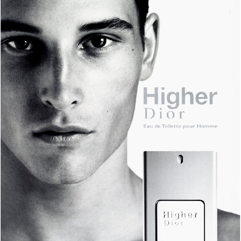 Advertisement for 'Higher Dior' men's perfume with a close-up of a man's face and the perfume bottle.