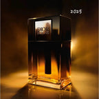 Dior Homme perfume bottle with a warm glow on a dark background