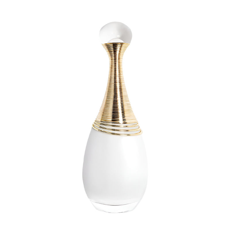 Decorative bottle with gold and white design on a light gray background