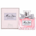 Dior Miss Dior Eau de Parfum 50ml spray bottle with a pink liquid and silver bow, shown next to its light pink packaging box.