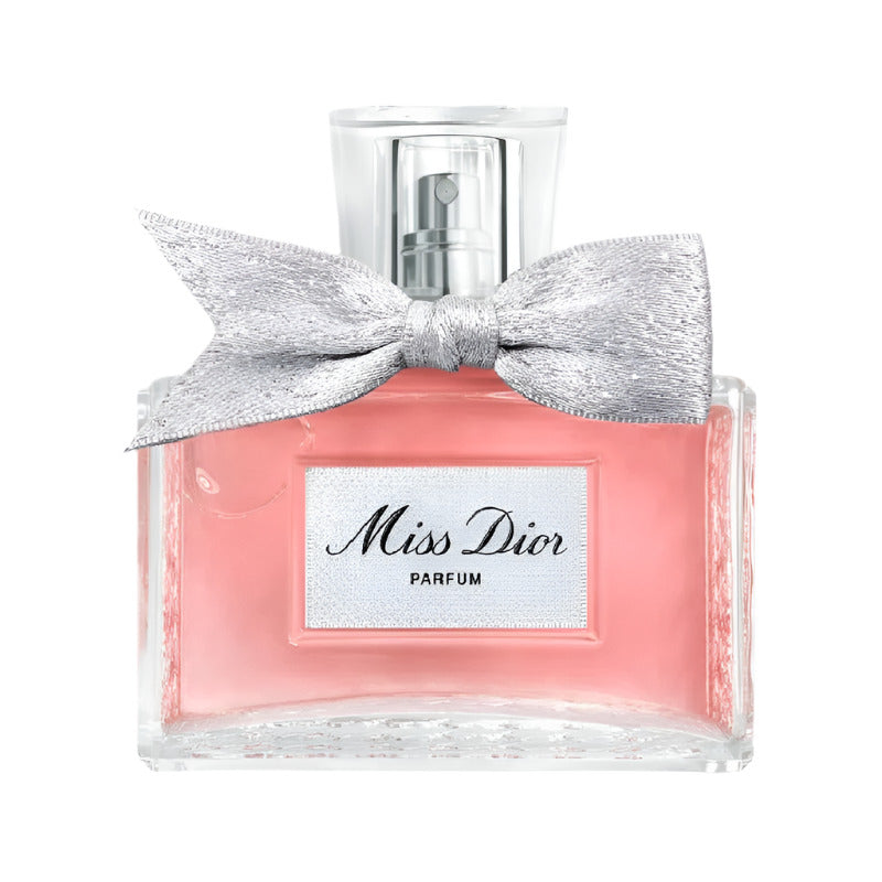 Bottle of Miss Dior Parfum with a silver bow on the cap, pink liquid visible through the clear glass, and label with 'Miss Dior PARFUM'.