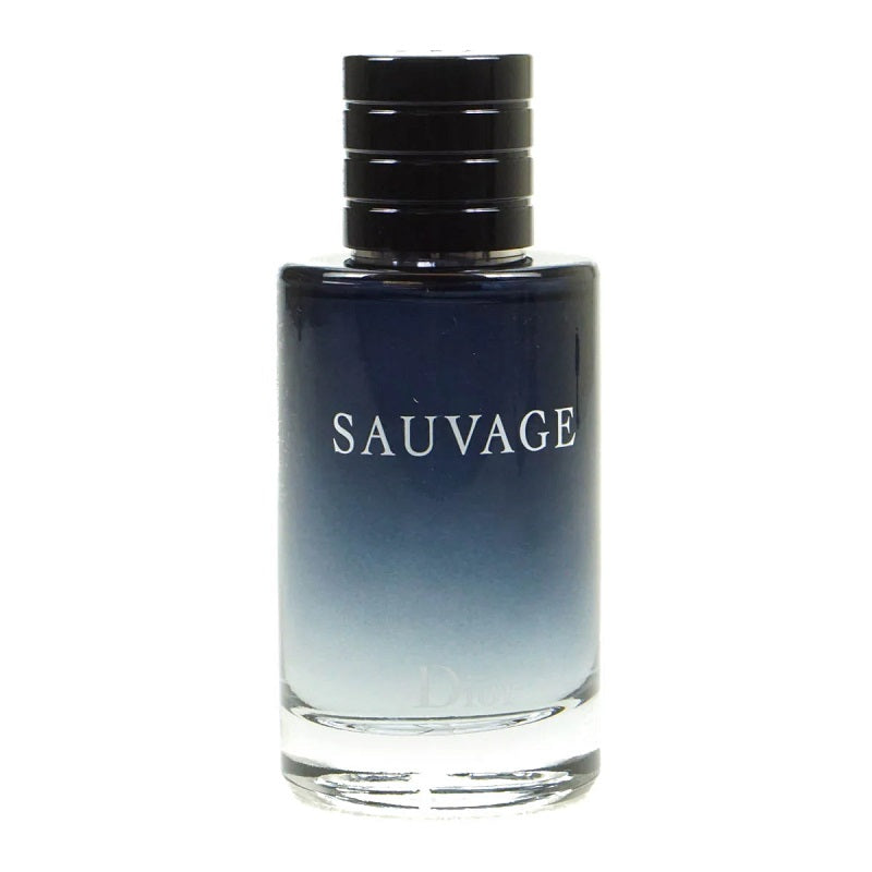 A glass bottle of Dior Sauvage eau de toilette with a black cap and gradient blue label.