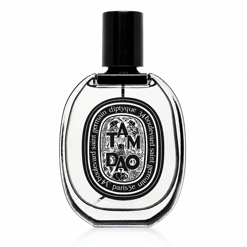 Diptyque Tam Dao Eau de Toilette bottle, featuring a clear glass body with a black cap and a detailed black and white label, set against a plain white background.
