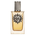 A bottle of Dolce & Gabbana perfume with a silver heart-and-sunburst emblem on the front, filled with amber-colored liquid and topped with a ribbed silver cap, shown on a plain white background.