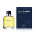A product image featuring Dolce & Gabbana Pour Homme Eau de Toilette spray bottle and its packaging box.