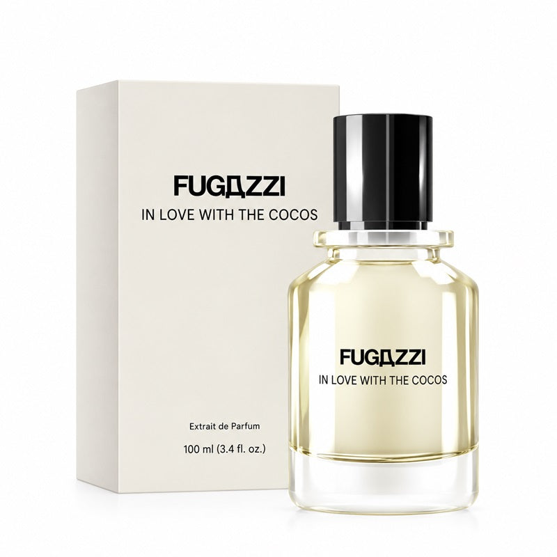 Fugazzi In Love With The Cocos 100ml Extrait de Parfum clear bottle beside its cream presentation carton with black branding on white