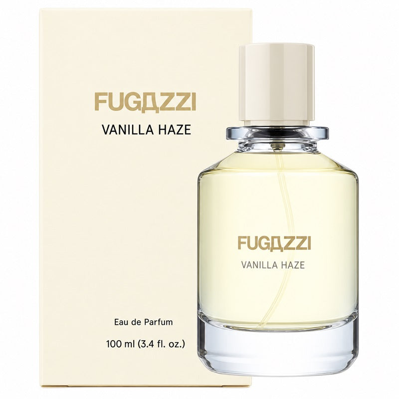 Fugazzi Vanilla Haze 100ml Eau de Parfum clear glass bottle with ivory cap beside its matching cream presentation package featuring Fugazzi branding and black Vanilla Haze lettering on a clean white background.
