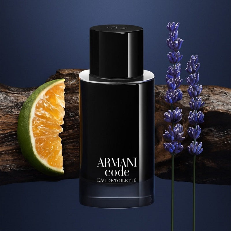 Armani Code perfume bottle with orange, lime, and lavender on a dark background