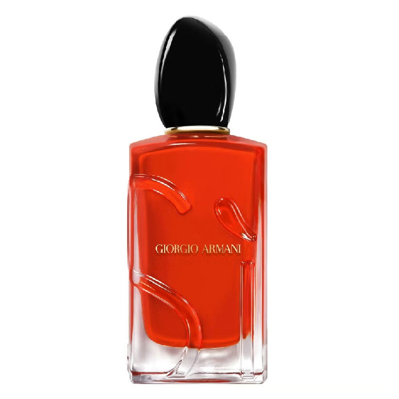 Red Giorgio Armani perfume bottle on a white background