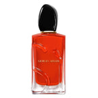 Red Giorgio Armani perfume bottle on a white background