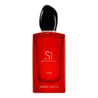 Red Giorgio Armani perfume bottle with black cap on a white background