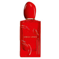 Red Giorgio Armani perfume bottle on a white background