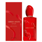 Red Giorgio Armani perfume bottle and packaging on a white background