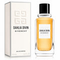 Dahlia Divin Givenchy Eau de Parfum bottle with amber liquid next to its white packaging box, featuring the Givenchy logo and black cap on a white background.