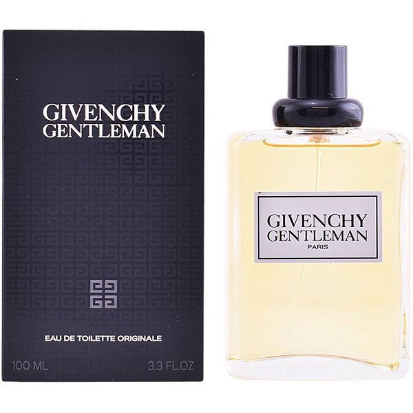 A 100ml bottle of Givenchy Gentleman Originale Eau de Toilette with a black box in the background. The bottle is clear with a white label and the box features a geometric pattern.