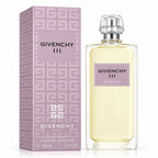 Givenchy III Eau de Toilette perfume bottle and its packaging box, both in a light lavender and pale yellow color scheme with silver caps, on a white background.