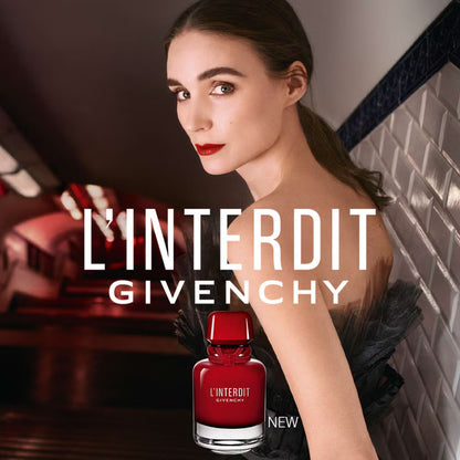Givenchy L'Interdit perfume bottle with a model in a bathroom setting