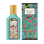 Gucci Flora perfume bottle and packaging with floral design on a light gray background
