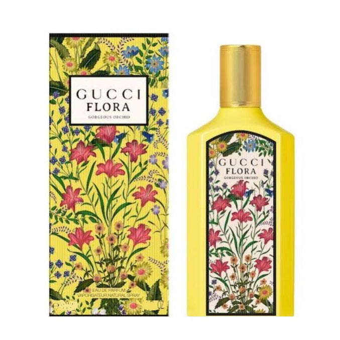 Gucci Flora Gorgeous Orchid Eau de Parfum bottle and presentation box by Gucci displayed on a pure white background.