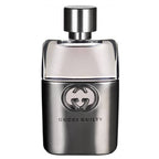 A bottle of Gucci Guilty for Men Eau de Toilette with a silver cap and a clear, slightly curved bottle displaying the Gucci logo.