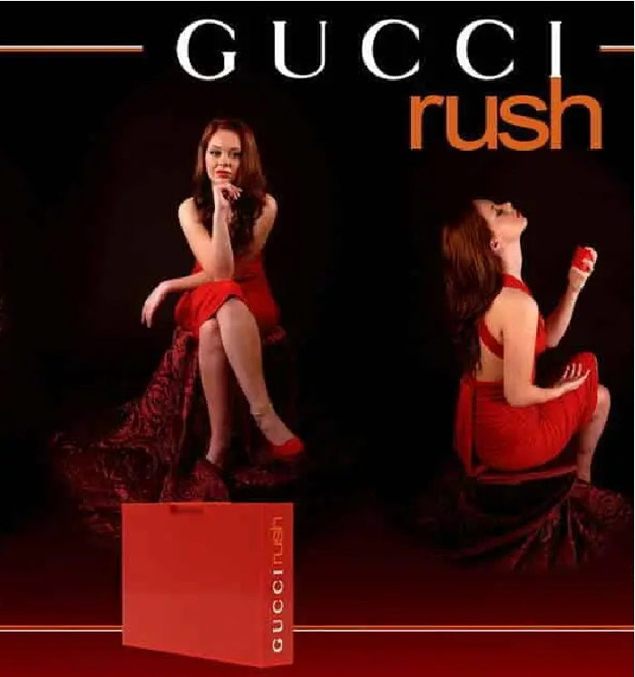 Gucci Rush advertisement with a woman in a red dress and a Gucci bag.