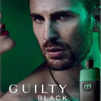 Gucci Guilty Black Pour Homme Eau de Toilette by Gucci positioned within a sophisticated urban evening setting reflecting confidence and modern masculinity.