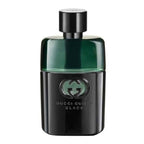 A bottle of Gucci Guilty Black Pour Homme eau de toilette with a black and green color scheme.