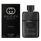 Gucci Guilty Pour Homme perfume shown with its black retail box and a glossy black spray bottle, both featuring the silver and dark gray interlocking G logo.