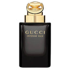 Gucci Intense Oud perfume bottle with gold cap on a white background
