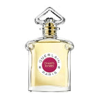 A glass bottle of Champs Elysees Eau de Toilette by Guerlain with a gold and pink label, a clear liquid visible inside, and a decorative cap.