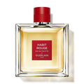 Perfume bottle of Habit Rouge by Guerlain on a white background