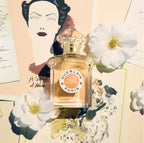 Perfume bottle with white flowers and artistic background