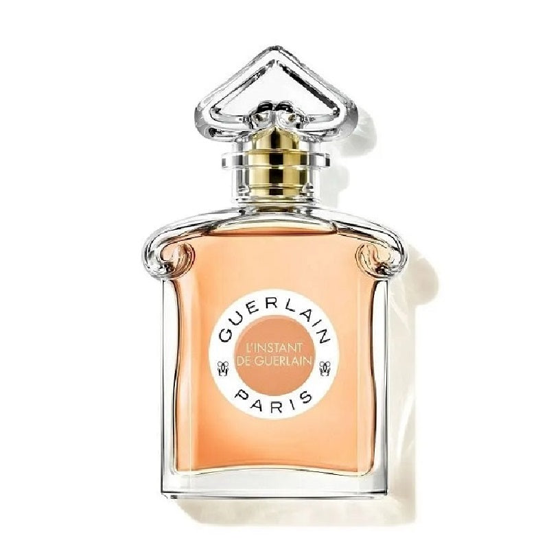 Perfume bottle with gold cap on white background