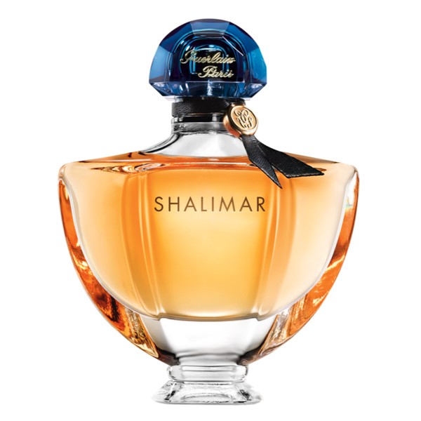 A bottle of Shalimar Eau de Parfum by Guerlain with a clear amber-colored liquid visible and a blue cap.