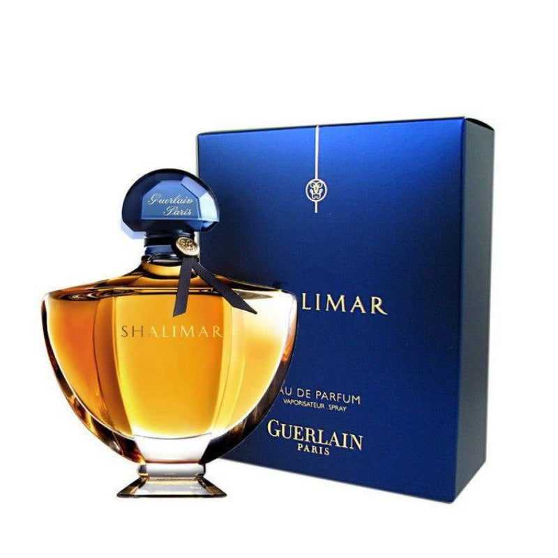 A product image featuring Shalimar Eau De Parfum by Guerlain in a50ml bottle with its blue packaging box.
